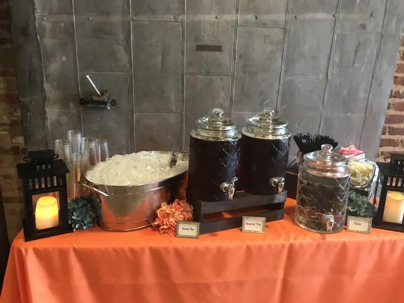 Self-serve drink station with sweet tea and lemonade