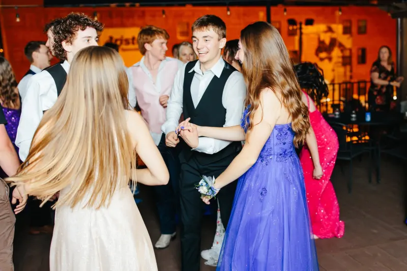 Students dancing on the rooftop deck at prom