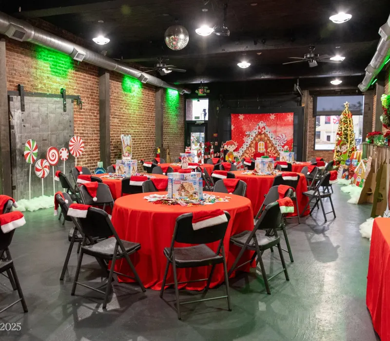 Children's Christmas party with gingerbread-house centerpieces